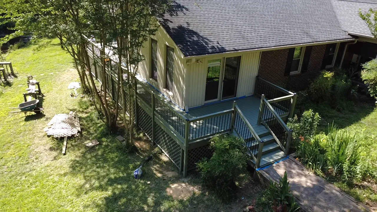 A deck and timber gazebo create connected places to gather alongside a tree-lined home. The gallery follows the work from site preparation and framing to the finished surface, railings and shade structure.