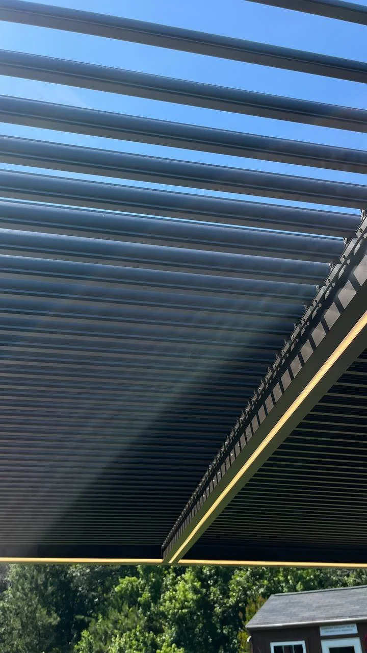 Shade for the gathering place. &mdash; project photograph