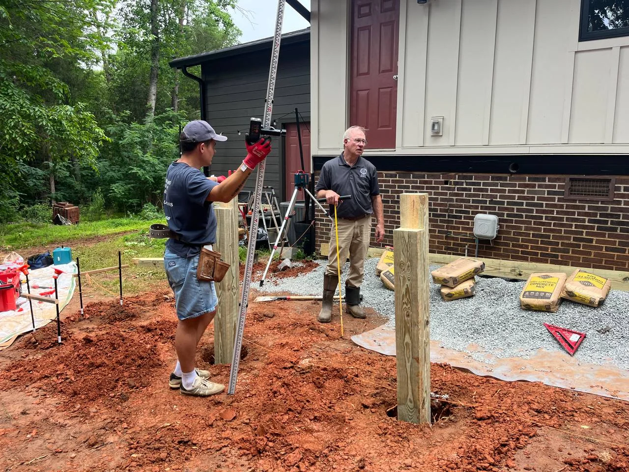Buddy Buildings team preparing a deck project