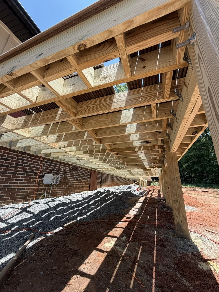 Deck framing and structural connections built by the Buddy Buildings crew